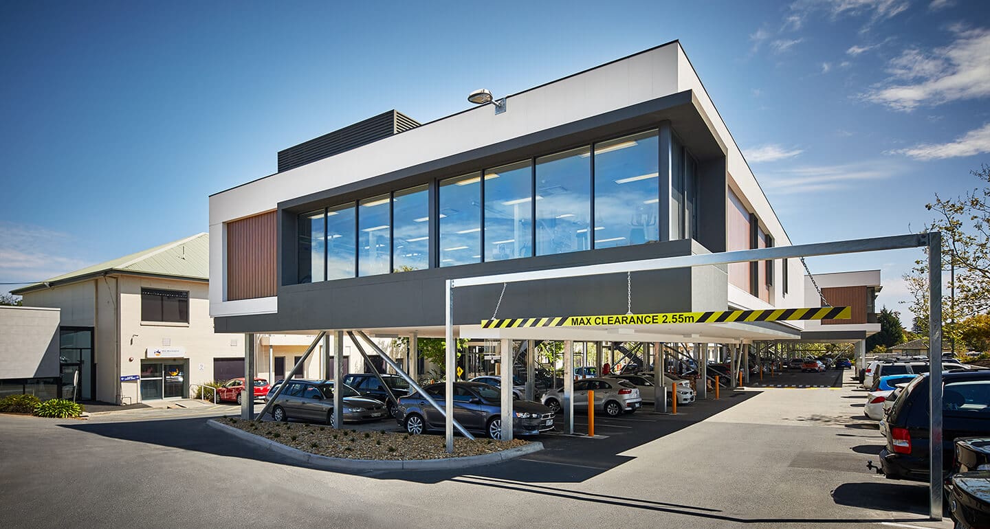 a building with cars parked in front of it