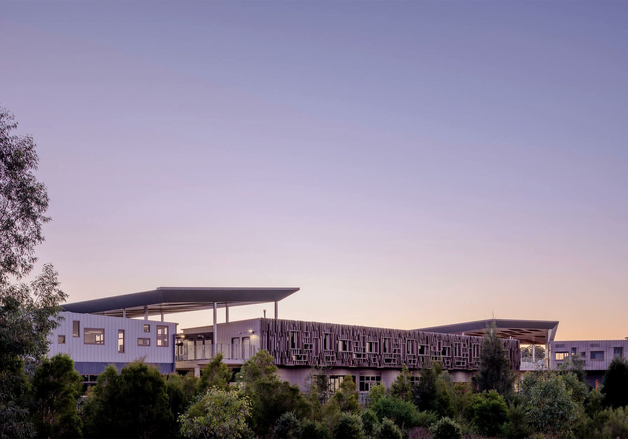 a building with trees in the background