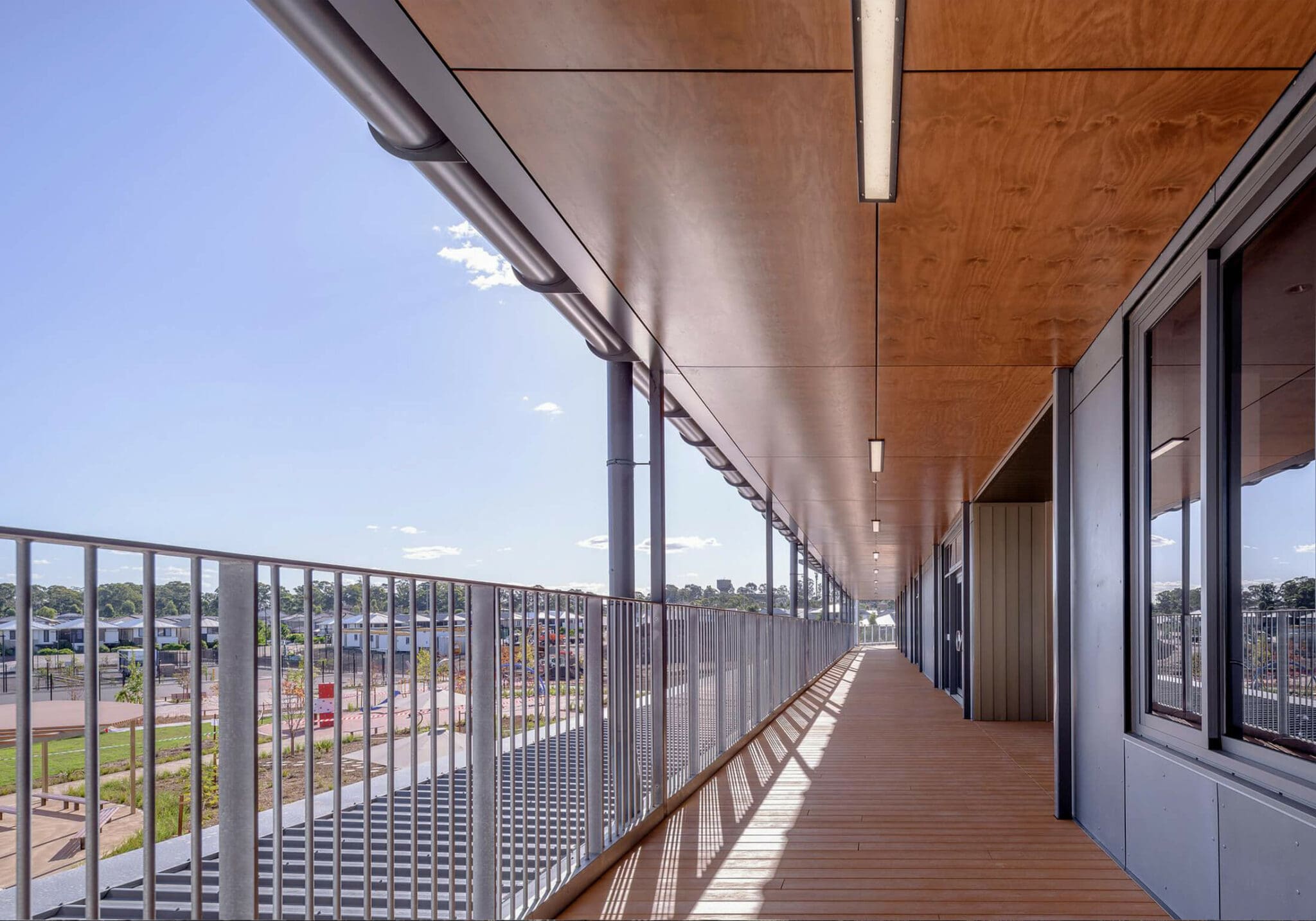 a wooden deck with a railing