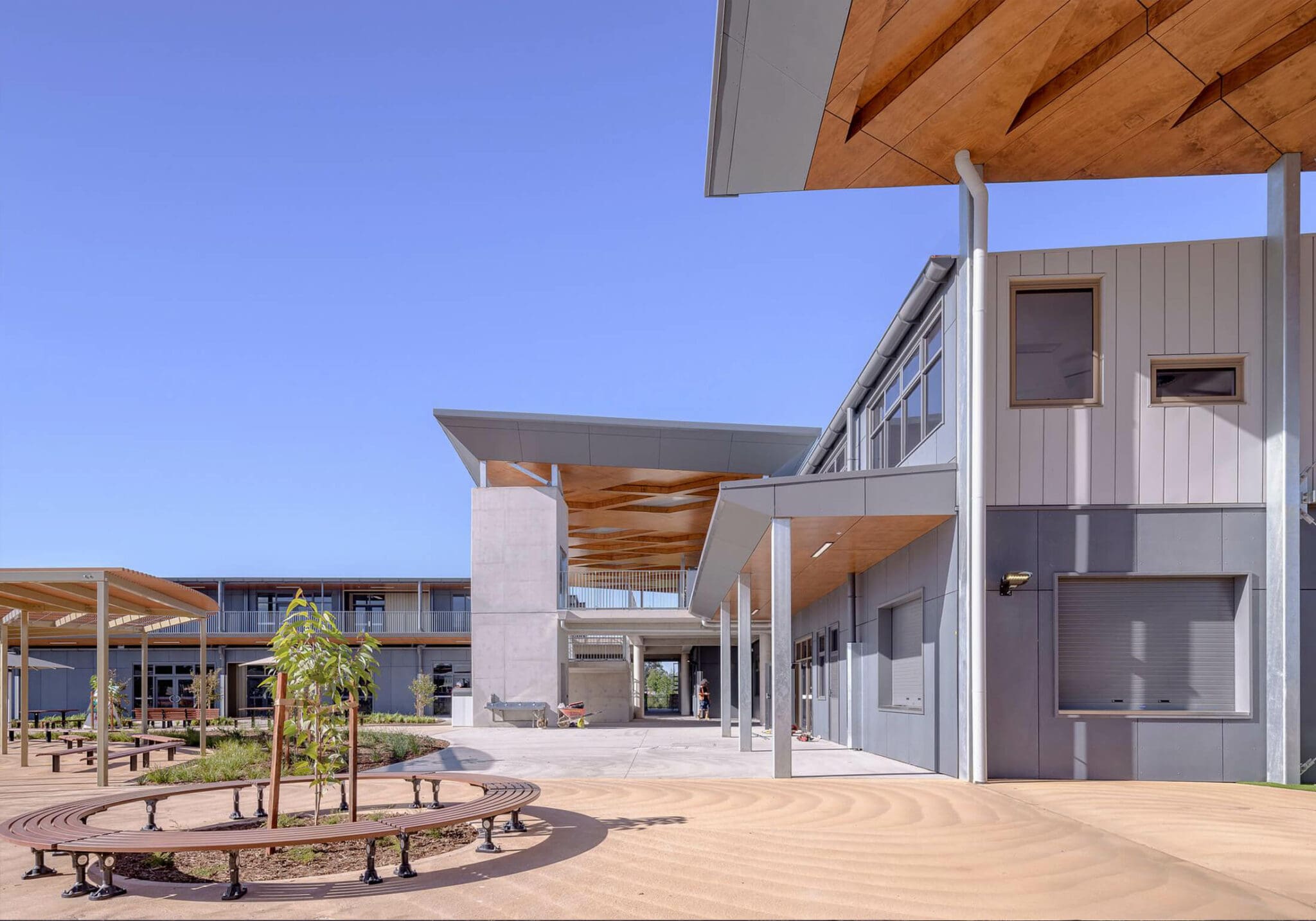 a building with a bench and benches