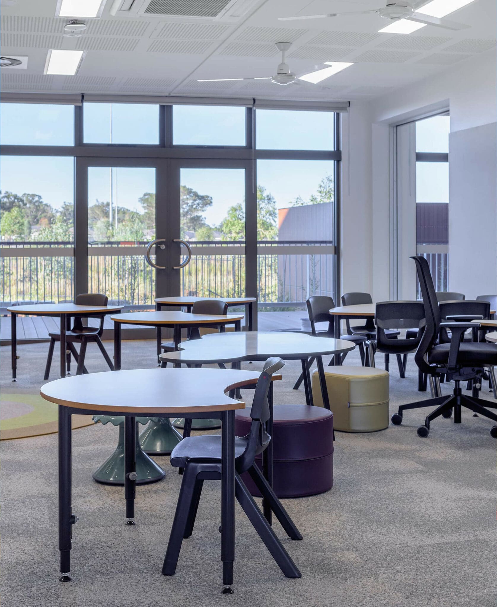 a room with tables and chairs