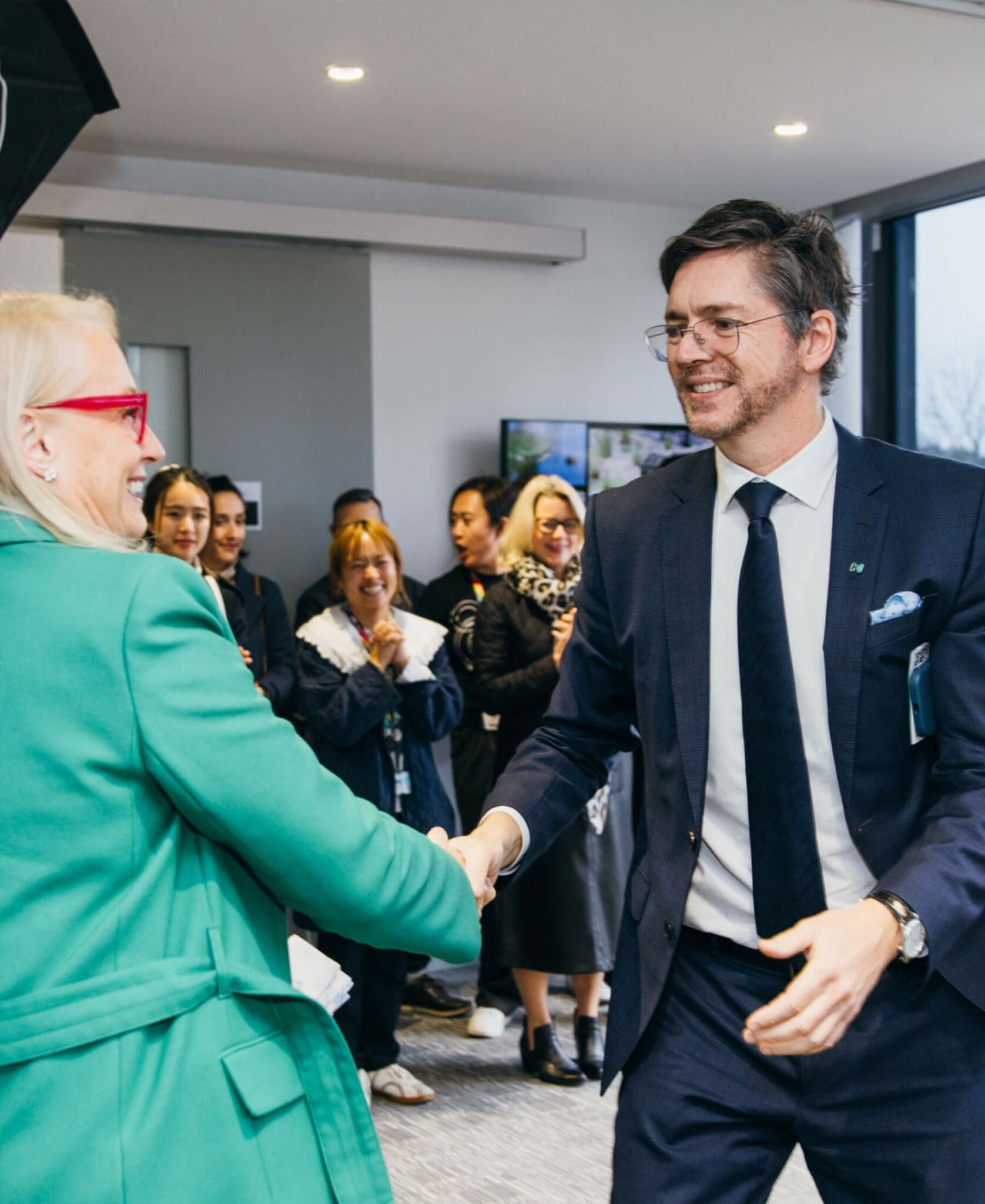 a man and woman shaking hands