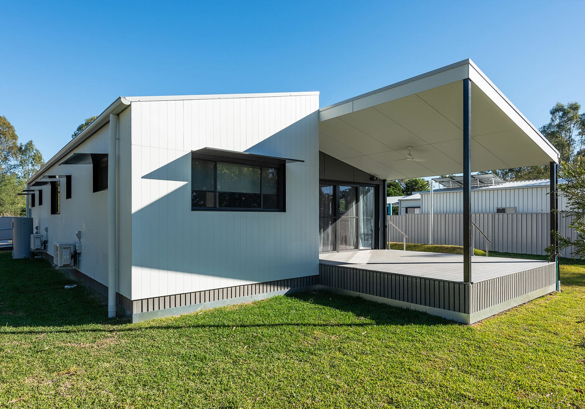 a white house with a covered porch